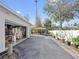 Long driveway to the house with a covered parking area, providing ample parking at 425 Fireball Ct, Punta Gorda, FL 33950