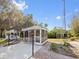 A trio of gazebos accent the grounds of this property at 425 Fireball Ct, Punta Gorda, FL 33950
