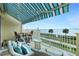 Spacious balcony with water views and ample seating at 4410 Warren Ave # 504, Port Charlotte, FL 33953