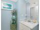 Bathroom featuring a white vanity and light blue walls at 4410 Warren Ave # 504, Port Charlotte, FL 33953