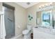 Bathroom with a shower, toilet and marble vanity at 4410 Warren Ave # 504, Port Charlotte, FL 33953