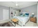 Spacious bedroom with king-size bed and private bathroom access at 4410 Warren Ave # 504, Port Charlotte, FL 33953
