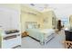 Second bedroom with a full bed and access to office at 4410 Warren Ave # 504, Port Charlotte, FL 33953