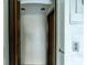 Residential elevator with wood paneling and simple design at 4410 Warren Ave # 504, Port Charlotte, FL 33953
