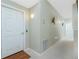 Bright hallway with neutral walls and carpeting at 4410 Warren Ave # 504, Port Charlotte, FL 33953