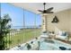 Peaceful lanai boasting water views and comfortable outdoor furniture at 4410 Warren Ave # 504, Port Charlotte, FL 33953