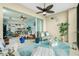 Spacious lanai with seating area and views of the water and living area at 4410 Warren Ave # 504, Port Charlotte, FL 33953