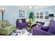 Cozy living room featuring comfortable seating and natural light at 4410 Warren Ave # 504, Port Charlotte, FL 33953