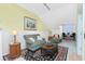 Sitting area with couch and coffee table, near kitchenette at 4410 Warren Ave # 504, Port Charlotte, FL 33953