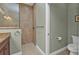 Bathroom with shower, toilet and granite vanity at 4590 Turnberry Cir, North Port, FL 34288