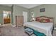 Spacious bedroom with ensuite bathroom access at 4590 Turnberry Cir, North Port, FL 34288