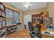 Spacious home office with L-shaped desk and ample storage at 4590 Turnberry Cir, North Port, FL 34288