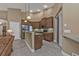 Kitchen with granite counters and breakfast bar at 4590 Turnberry Cir, North Port, FL 34288