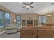 Spacious living room with built-in entertainment center and comfortable seating at 4590 Turnberry Cir, North Port, FL 34288