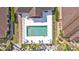 Community pool with surrounding patio and lounge chairs at 4590 Turnberry Cir, North Port, FL 34288
