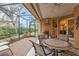 Spacious screened patio perfect for outdoor dining at 4590 Turnberry Cir, North Port, FL 34288