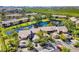 Scenic community with townhomes nestled around a picturesque pond and water fountain at 5220 Landings Blvd # 104, Sarasota, FL 34231