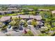 Beautiful community featuring townhomes surrounding a tranquil pond and lush landscaping at 5220 Landings Blvd # 104, Sarasota, FL 34231