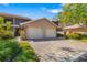 Attractive home with a two-car garage, brick-paved driveway, and well-maintained landscaping at 5220 Landings Blvd # 104, Sarasota, FL 34231