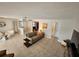 Bright living room with tile floors, sofa, and access to other rooms at 529 Belvedere Ct, Punta Gorda, FL 33950