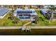 Backyard oasis with heated pool, solar panels, and private dock at 529 Belvedere Ct, Punta Gorda, FL 33950