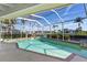 Relaxing screened pool area overlooking the canal at 606 Santa Margerita Ln, Punta Gorda, FL 33950