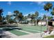 Community bocce ball courts with benches and palm trees at 6501 Center Ln, North Port, FL 34287