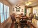 Charming dining area with a round table and four chairs at 6501 Center Ln, North Port, FL 34287