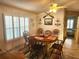 Charming dining area with wooden table and coastal decor at 6501 Center Ln, North Port, FL 34287