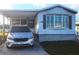 Front view of a single wide manufactured home at 6501 Center Ln, North Port, FL 34287