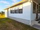 Well-maintained home exterior with brick skirting at 6501 Center Ln, North Port, FL 34287