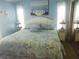 Spacious main bedroom with king-size bed and calming decor at 6501 Center Ln, North Port, FL 34287