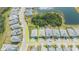 Aerial view showing home's location and proximity to lake at 12717 Morning Mist Pl, Venice, FL 34293