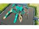 Modern playground with slides, climbing structures, and safety surfacing at 12717 Morning Mist Pl, Venice, FL 34293
