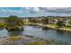 Waterfront community with lush landscaping and lake views at 1407 Red Oak Ln, Port Charlotte, FL 33948
