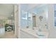 Bathroom view of counter, sink, and mirror into living area at 1407 Red Oak Ln, Port Charlotte, FL 33948