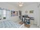 Bedroom furnished with a bed, desk, and bookcase, creating a functional and comfortable space at 1407 Red Oak Ln, Port Charlotte, FL 33948