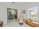 Inviting bonus room with comfortable seating and bright natural light at 1407 Red Oak Ln, Port Charlotte, FL 33948