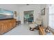 Well-lit bonus room with a relaxing atmosphere and easy access to living area at 1407 Red Oak Ln, Port Charlotte, FL 33948