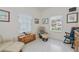 Comfortable bonus room with stylish furniture and sun-filled windows at 1407 Red Oak Ln, Port Charlotte, FL 33948