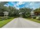 Community entrance with lush landscaping and well-maintained grounds, creating an inviting arrival experience at 1407 Red Oak Ln, Port Charlotte, FL 33948