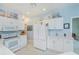 Well-lit white kitchen with modern appliances and décor at 1407 Red Oak Ln, Port Charlotte, FL 33948
