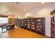 Beautiful community library featuring rows of bookshelves and a comfortable reading area at 1407 Red Oak Ln, Port Charlotte, FL 33948