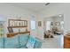 Comfortable living room with decorative door and a seating area beyond at 1407 Red Oak Ln, Port Charlotte, FL 33948