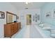 Cozy main bedroom offering a peaceful retreat with soft blue accents at 1407 Red Oak Ln, Port Charlotte, FL 33948
