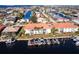 Wider aerial of property, neighborhood and waterway at 141 Tropicana Dr # 1111, Punta Gorda, FL 33950