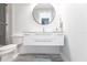 Modern bathroom with floating vanity and large mirror at 141 Tropicana Dr # 1111, Punta Gorda, FL 33950