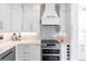 Modern kitchen with stainless steel appliances and white cabinets at 141 Tropicana Dr # 1111, Punta Gorda, FL 33950