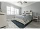 Spacious bedroom with large bed and nautical decor at 141 Tropicana Dr # 1111, Punta Gorda, FL 33950