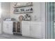 Outdoor bar with wine cooler and espresso machine at 141 Tropicana Dr # 1111, Punta Gorda, FL 33950